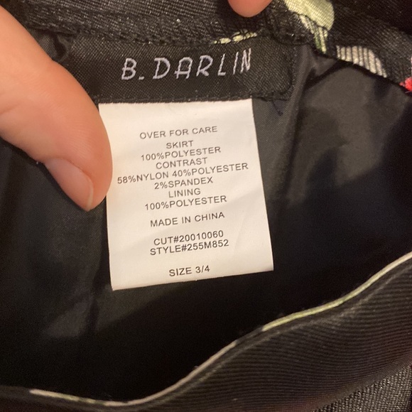 This is a two piece B. Darlin prom dress with a red top and floral skirt - Picture 7 of 7